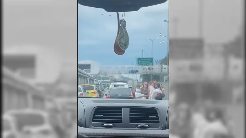 Vídeo: Família foge de assalto a veículos na Avenida Brasil