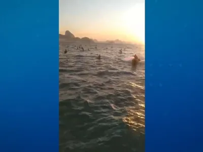 Ventania arrasta praticantes de stand up paddle no mar de Copacabana, no RJ